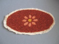 Oval mat with pile