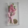 Spray of pink roses by Clara