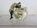 Cat and goldfish