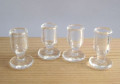 Four stemmed glasses