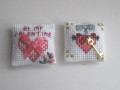 Pair of hand stitched valentine cushions