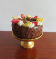 Chocolate gateau on brass cakestand