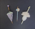 3 ladies parasols