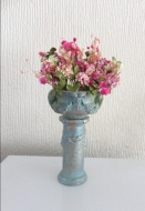 Filled flower urn pink flowers