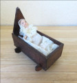 Tudor style cradle & baby