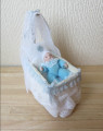Draped cradle & baby boy
