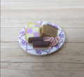 Plate of cakes by Delph