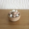 Wood bowl with eggs