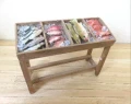 Shop display stand with fish