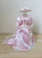 Ladies pink gown & hat set on mannequin