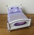 Dressed bed in purple 