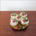 Board with  Christmas cupcakes
