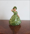 Green lady figurine by Mack