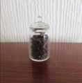 Filled lidded jar