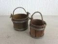 Two wooden buckets