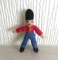 Hand knitted soldier