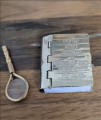 Dictionary and magnifying glass