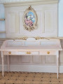 Aged white side table