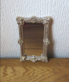 Ornate gold frame mirror