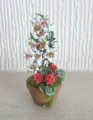 Pot of geraniums & lilies
